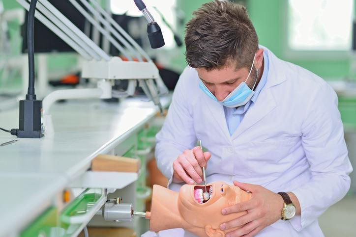 Dental hygiene student practising clinical assessment skills